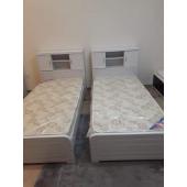 Two single beds with mattresses for sale
